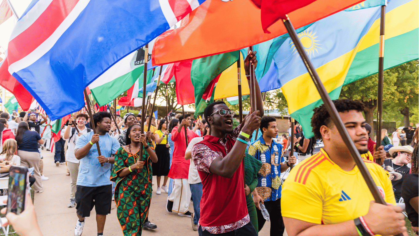 International students marching with flags at ORU culture fest